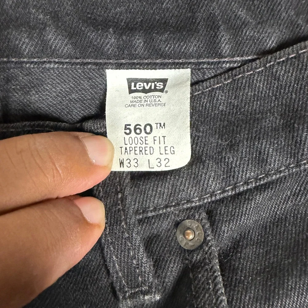 Vintage Levis 560 Black Loose Fit Tapered Leg Jeans Mens 33x32 Made in USA 1997